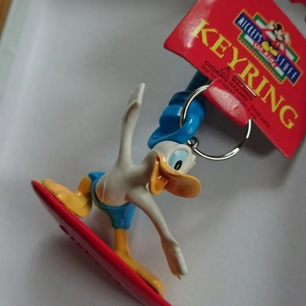 New vintage Donald Duck surfboard keychain with clip
